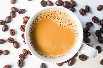 cup of coffee with beans
