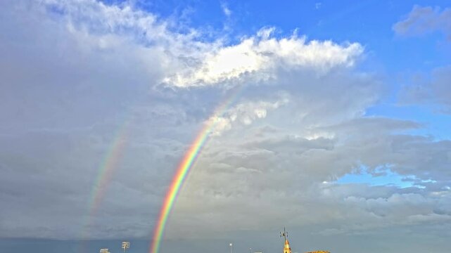 Birds Doble Rainbow in the afternoon on a rain day from Catalonia Spain.