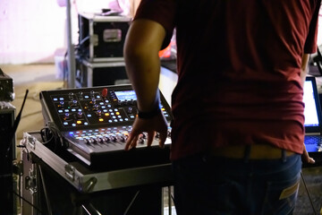 Close-up of a professional audio mixer.