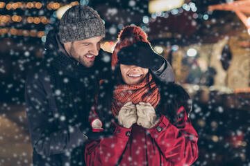 Marry me. Portrait of his he her she nice attractive charming lovely cheerful cheery couple wearing warm outfit guy making proposal giving engagement ring 14 February honeymoon outdoors