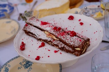 Chocolate Roulade topped with fresh and freeze-dried raspberries