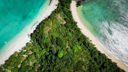 Aerial view of Nosy Iranja Island showcasing lush vegetation and turquoise waters in Madagascar...
