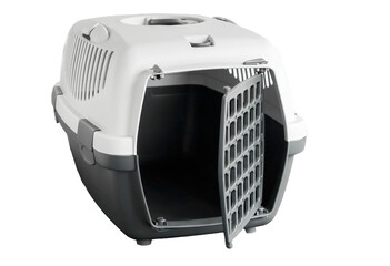 Empty gray plastic pet carrier isolated on white background close-up. Opened door. Side view. Concept of safe transportation of domestic animals.