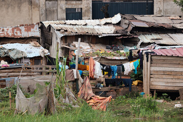 Colorful laundry hangs in a vibrant suburb of Antananarivo, Madagascar, showcasing daily life in a densely populated area