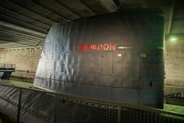 The top, or fin, of the Espadon submarine, a 1960s warship docked in the port of Saint-Nazaire, in the Atlantic Loire. Vertical shot.