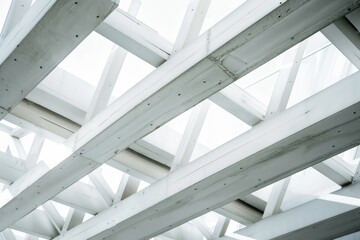 An abstract perspective of modern architectural beams crisscrossing in a geometric fashion under soft, diffused lighting.