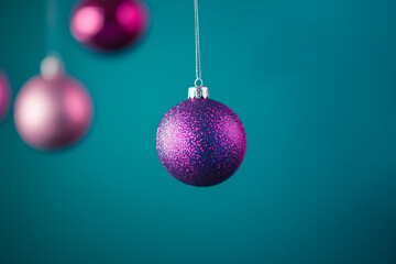 Fototapeta premium Festive Purple Christmas Bauble Hanging