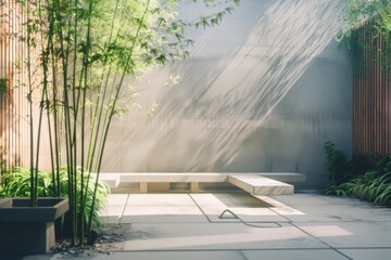 Sunlight streams into a tranquil garden courtyard with bamboo and minimalist benches, evoking feelings of serenity and peace.