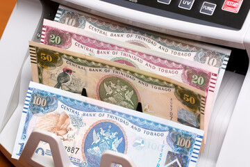 Trinidad and Tobago dollar in the counting machine