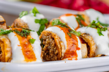 Turkish traditional street food tantuni wrap. Delicious Turkish kebab