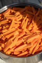 Sliced carrots for pilaf. Ingredients for pilaf. Vegetables