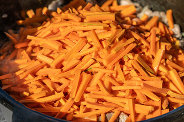 Sliced carrots for pilaf. Ingredients for pilaf. Vegetables