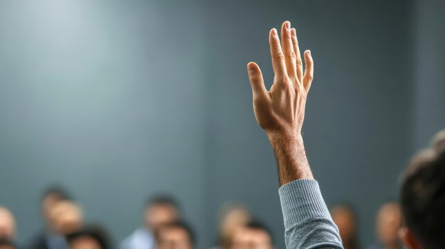 Group of diverse professionals in an open forum discussion, hands raised, speakers addressing the crowd, interactive session, corporate setting