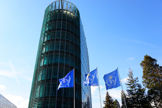 Geneva, Switzerland, Europe : flags of  WMO - World Meteorological Organization in front of WMO headquarters building, Agency of United Nations