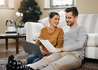 Laptop, paperwork and documents with couple in living room for investment portfolio, planning and...