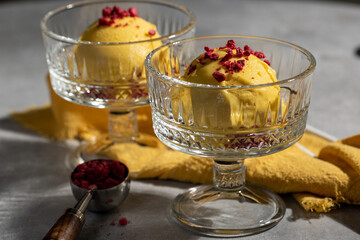 Mango and passion fruit ice cream ball