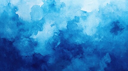 Obraz premium Beautiful blue watercolor texture with varying shades and soft edges, ideal for backgrounds and artistic designs.