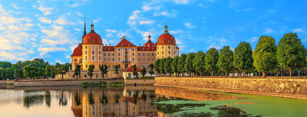 Naklejka premium Moritzburg Castle is a Baroque palace surrounded by a lake.