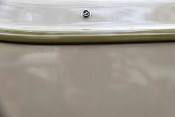 Beige sheet metal of an old retro car of 1920s
