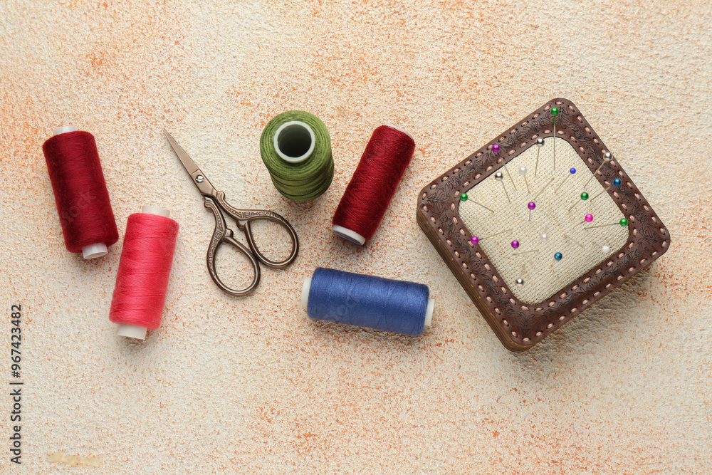 Poster Flat lay composition with different sewing supplies on beige textured table