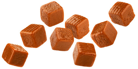 Flying caramel candies, toffee bonbons isolated on white background