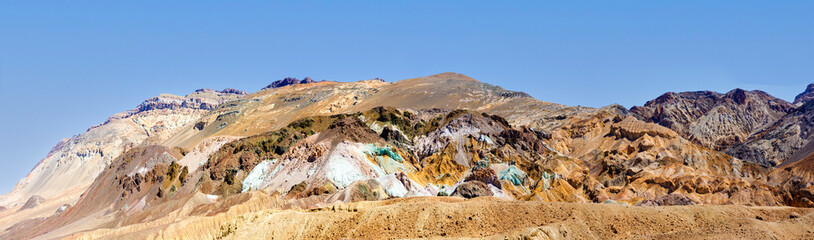 road Artists Drive in Death valley with colorful stones, hills  with minerals, blinking colorful in the sun