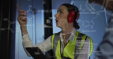 Animation of data processing and chemical formula over diverse workers in server room - Powered by Adobe