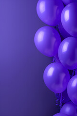 Purple balloons on a bright violet copy space background. Party decoration colorful design, perfect for greeting card and birthday invitation. Event and anniversary wallpaper with shiny lilac balloons
