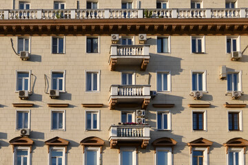 .Stalinist architecture buildings of the USSR in Moscow, Russia. Facade with balconies and air conditioners