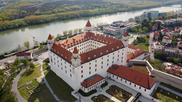 Stunning 4K drone footage of Bratislava Castle. Explore breathtaking aerial views of this iconic hilltop fortress overlooking the Danube River and the beautiful city of Bratislava
