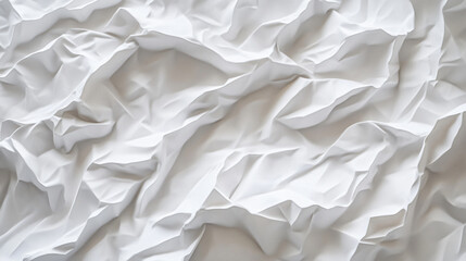 Obraz premium A textured close-up of crumpled white paper, showcasing the intricate folds and creases that create a visually interesting pattern, perfect for backgrounds and design.