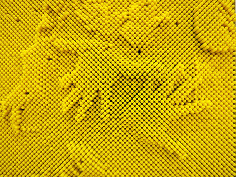 Beautiful hand print on yellow dot pin screen at Kids Playground