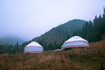Kazakh national yurt with national ornament. Autumn mountains on the background. Kazakhstan,...