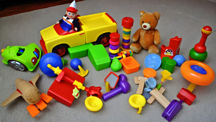 Obraz premium Variety of toys, colorful toys, stack of toys, ai generated