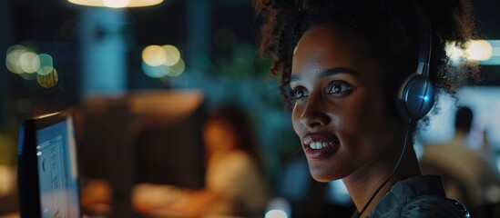 Smiling Woman Working on Computer in Office