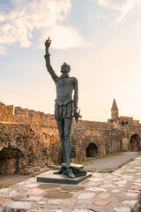 Fototapeta premium Cervantes statue in Nafpaktos in Greece. A famous touristic destination. 