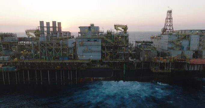Macao, Brazil - 01 August 2024: Aerial view of the industrial offshore support vessel FPSO FORTE surrounded by ocean waves, Macae, Brazil.