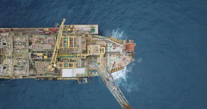 Macao, Brazil - 01 August 2024: Aerial view of the industrial offshore support vessel FPSO FORTE surrounded by ocean waves, Macae, Brazil.