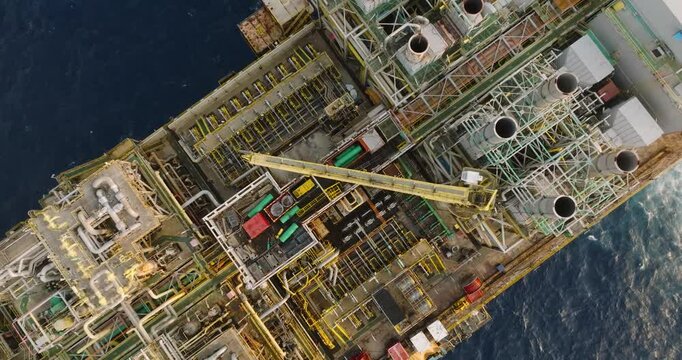 Macao, Brazil - 01 August 2024: Aerial view of the industrial offshore support vessel FPSO FORTE surrounded by ocean waves, Macae, Brazil.