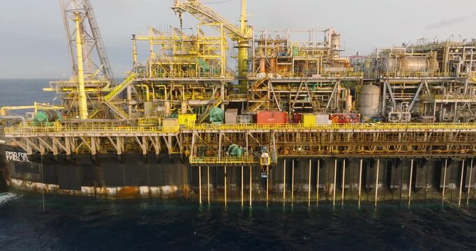 Macao, Brazil - 01 August 2024: Aerial view of the industrial offshore support vessel FPSO FORTE surrounded by ocean waves, Macae, Brazil.
