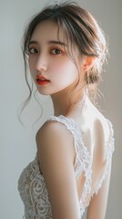 young woman wearing a white dress with lace shoulder straps, elegant makeup, bright eyes, shoulder-length hair, indoor portrait photography, soft light, warm tones, and a gentle smile,Generative AI