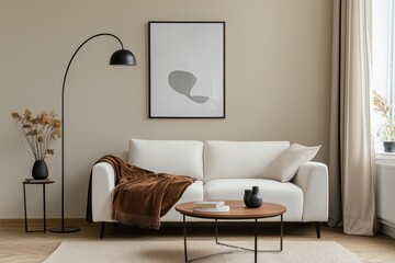 Featuring a modern sofa, abstract wall art, and cozy furnishings, this living room showcases a warm atmosphere.
