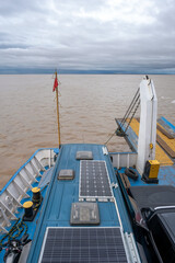 A campervan on one of the boats navigating the Amazon River in Brazil