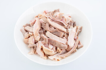 A dish of blanched pork belly slices