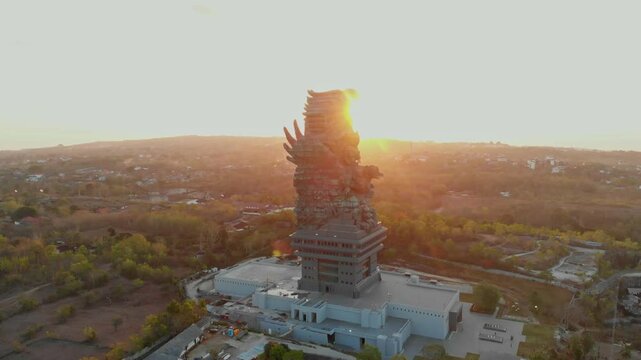 Aerial view of GWK statue at sunset in cultural park, Kuta Selatan, Indonesia.
