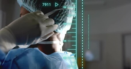 Animation of data processing over african american female surgeon in operating theatre - Powered by Adobe