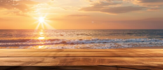 Obraz premium Sensational sunset over serene ocean waves with a wooden deck in the foreground, capturing a tranquil moment in nature.
