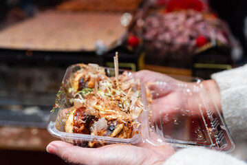 Tasty famous takoyaki japanese street food at Dotonbori Osaka Japan.