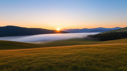A breathtaking sunrise over misty valley, with rolling hills and lush green grass. warm sunlight breaks through fog, creating serene and tranquil atmosphere.