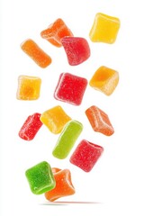 Colorful fruit jelly candies falling down isolated on white background